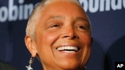 FILE - Dr. Camille Cosby, wife of comedian Bill Cosby, attends the Jackie Robinson Foundation annual awards dinner, March 3, 2008, in New York. Lawyers for Bill Cosby's wife have filed an emergency motion to postpone her deposition while she appeals a magistrate judge's order.