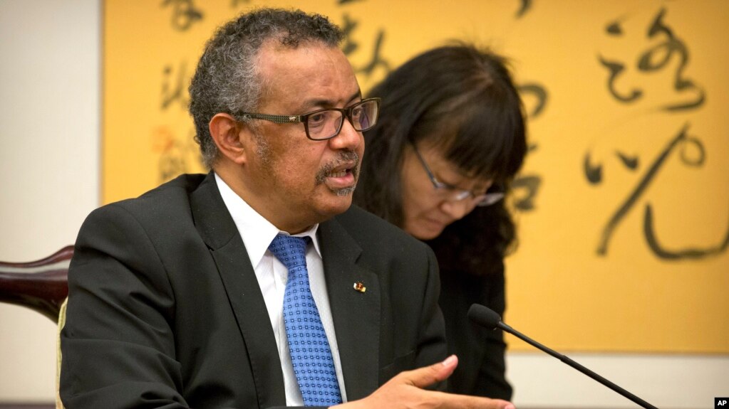 Tedros Adhanom Ghebreyesus, director general of the World Health Organization (WHO), speaks during a meeting with Chinese Foreign Minister Wang Yi at the Ministry of Foreign Affairs in Beijing, Tuesday, July 17, 2018. (AP Photo/Mark Schiefelbein, Pool)