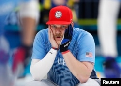Second Matt Hamilton of the U.S. men's curling team reacts. The team upset Sweden to win the first gold medal for curling in U.S history, Feb. 24, 2018, in Gangneung, South Korea.