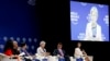 South Korean Foreign Minister Kang Kyung-Wha, center, gestures during a discussion on Asia's Geopolitical Outlook in the ongoing World Economic Forum on ASEAN at the National Convention Center Thursday, Sept. 13, 2018, in Hanoi, Vietnam. Listening from left are, moderator Julie Yoo, Sri Lankan Prime Minister Ranil Wickremesinghe, Vietnamese Deputy Prime Minister, and Foreign Minister Pham Binh Minh, Kang, Japanese Foreign Minister Taro Kono, and Lynn Kuok of the Institute of International Strategic Studies, Singapore. The World Economic Forum has attracted hundreds of participants with the theme: ASEAN 4.0: Entrepreneurship and the Fourth Industrial Revolution. (AP Photo/Bullit Marquez)