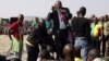 South African Mine Re-opens as Tensions Continue