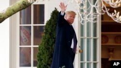 President Donald Trump walks to the Oval Office after speaking at the Latino Coalition Legislative Summit, March 7, 2018, in Washington. 