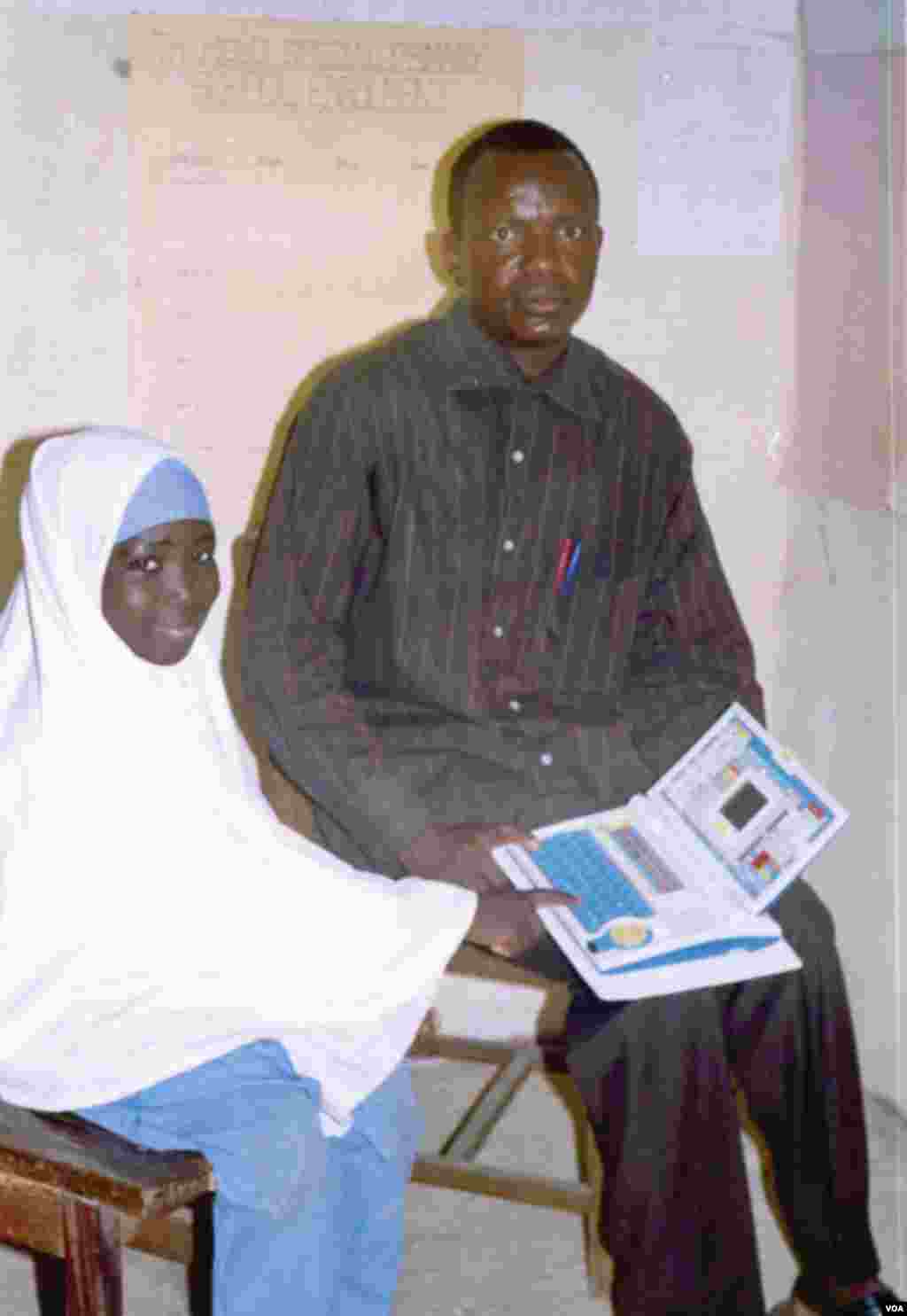 Mustapha Aminu Gumel at a school in Jigawa State, Nigeria, gets news from VOA.