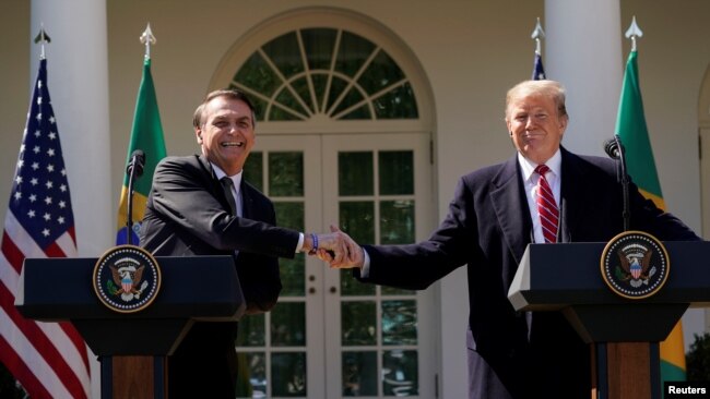巴西总统博尔索纳罗2019年3月19日在白宫与美国总统特朗普举行记者会（路透社）