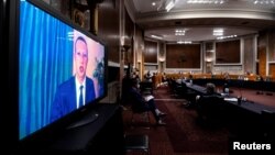 Марк Цукерберг, исполнительный директор Facebook, дает показания во время слушаний комитета Сената в Вашингтоне, 17 ноября 2020 года