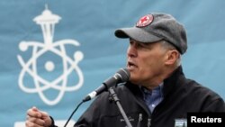 FILE - Washington Gov. Jay Inslee speaks during a rally at the beginning of the March For Science in Seattle, Washington, April 22, 2017.