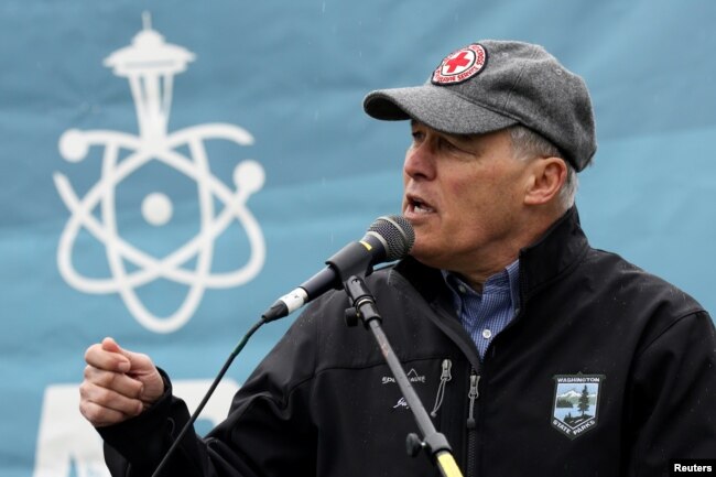 FILE - Washington Gov. Jay Inslee speaks during a rally at the beginning of the March For Science in Seattle, Washington, April 22, 2017.