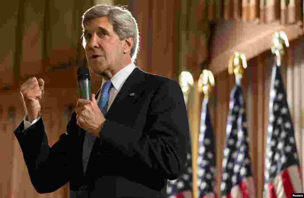 U.S. Secretary of State John Kerry speaks to staff from the U.S. Embassy in Kuwait City, Kuwait, June 26, 2013.