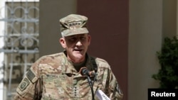 U.S. Army General John Nicholson, Commander of Resolute Support forces and U.S. forces in Afghanistan, speaks during a memorial ceremony to commemorate the 15th anniversary of the 9/11 attacks, in Kabul, Afghanistan, Sept. 11, 2016.