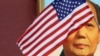 资料照：为欢迎美国时任总统特朗普访华，北京天安门毛泽东画像前飘扬的美国国旗。（2017年11月8日）