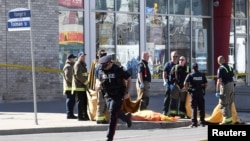 Policija na mestu napada u predgrađu Toronta, 24. april 2018.