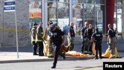 Policija na mjestu napada u predgrađu Toronta, 24. april 2018.