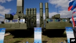 FILE - Russia's sophisticated S-300 air defense systems is on display at the opening of the MAKS Air Show in Zhukovsky, outside Moscow, Russia, Aug. 27, 2013. 