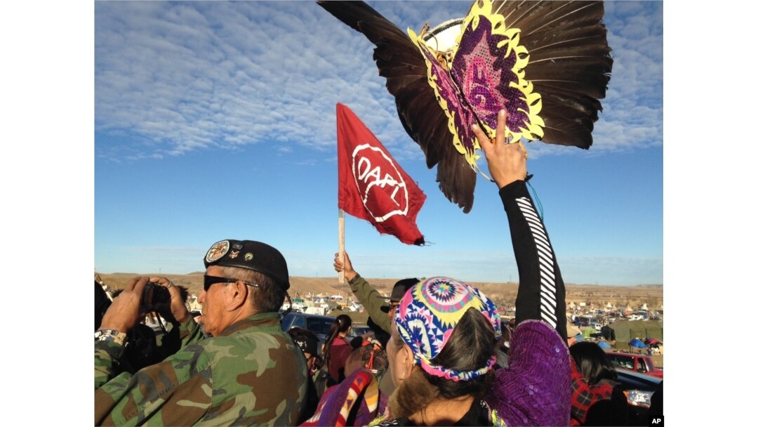 Demonstrators against the Dakota Access oil pipeline hold a ceremony at the main protest camp near Cannon Ball, North Dakota, Nov. 15, 2016.