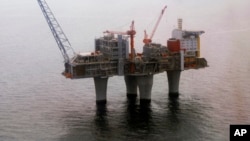 FILE - The Troll A, gas platform run by the Norwegian oil giant Statoil company, standing above the North Sea, about 70 kilometers off the coast of Norway.