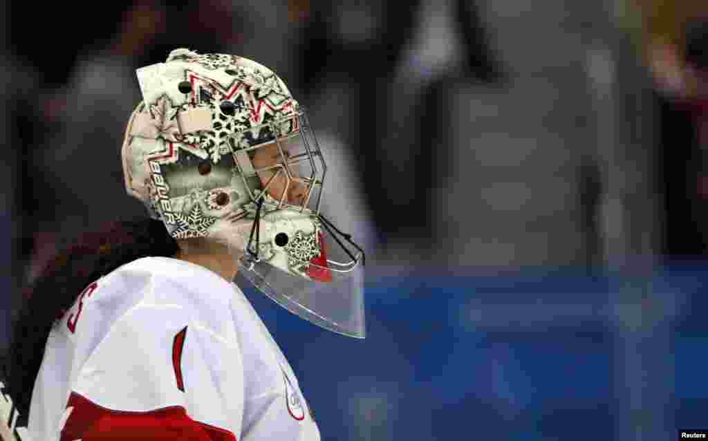 Goalie Shannon Szabados of Canada watches the women's gold medal hockey game in Gangneung, South Korea, Feb. 22, 2018.