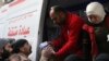 Voluntários distribuem medicamentos em Ghouta, Síria (foto obtida na media social)