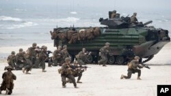 미군 해병대가 지난 6월 리투아니아에서 열린 나토 합동 군사훈련에 참가했다.