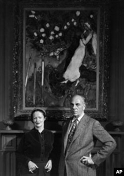 Founders Wally and Lila Wallace in front of modernist painter Marc Chagall's 'Three Candles,' one of many original pieces of art that graced the hallways at Reader's Digest headquarters.