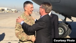 U.S. Defense Secretary Ash Carter arrives Dec. 11, 2016 in Baghdad, Iraq, to assess the progress of the fight against Islamic State in Mosul. He is greeted by Lieutenant General Stephen Townsend, commander of Operation Inherent Resolve. (Photo by U.S. Department of Defense)