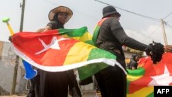 Des Togolaises protestent contre le pouvoir dans les rues de Lomé, au Togo, le 20 janvier 2018.