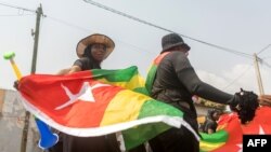 Des Togolaises protestent contre le pouvoir dans les rues de Lomé, au Togo, le 20 janvier 2018.