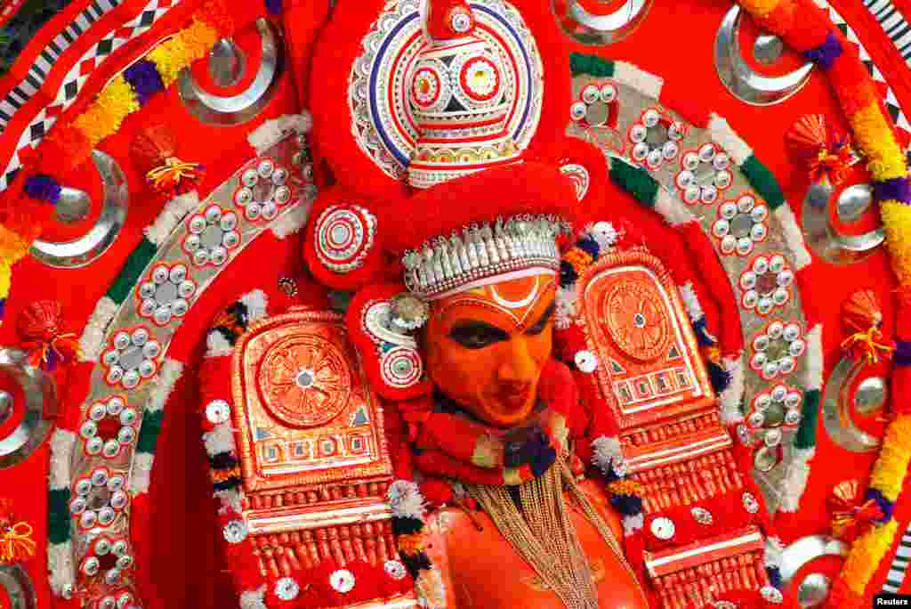 A dancer performs during the full dress rehearsal for the Republic Day parade in New Delhi, India.