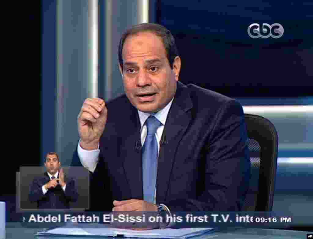 Former army chief Abdel-Fattah el-Sissi listens to a question during an interview in a nationally televised program on Egypt&#39;s State Television, in Cairo, May 5, 2014.