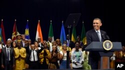FILE- Former U.S. President Barack Obama speaks to 2014 graduates of the Mandela Washington Fellowship. 