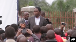 FILE - Presidential candidate Hakainde Hichilema addresses supporters in Lusaka, Zambia, Wednesday, Jan, 21, 2015.