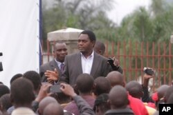 FILE - Presidential candidate Hakainde Hichilema addresses supporters in Lusaka, Zambia, Wednesday, Jan, 21, 2015.