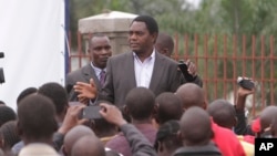 FILE - Presidential candidate Hakainde Hichilema addresses supporters in Lusaka, Zambia, Wednesday, Jan, 21, 2015.