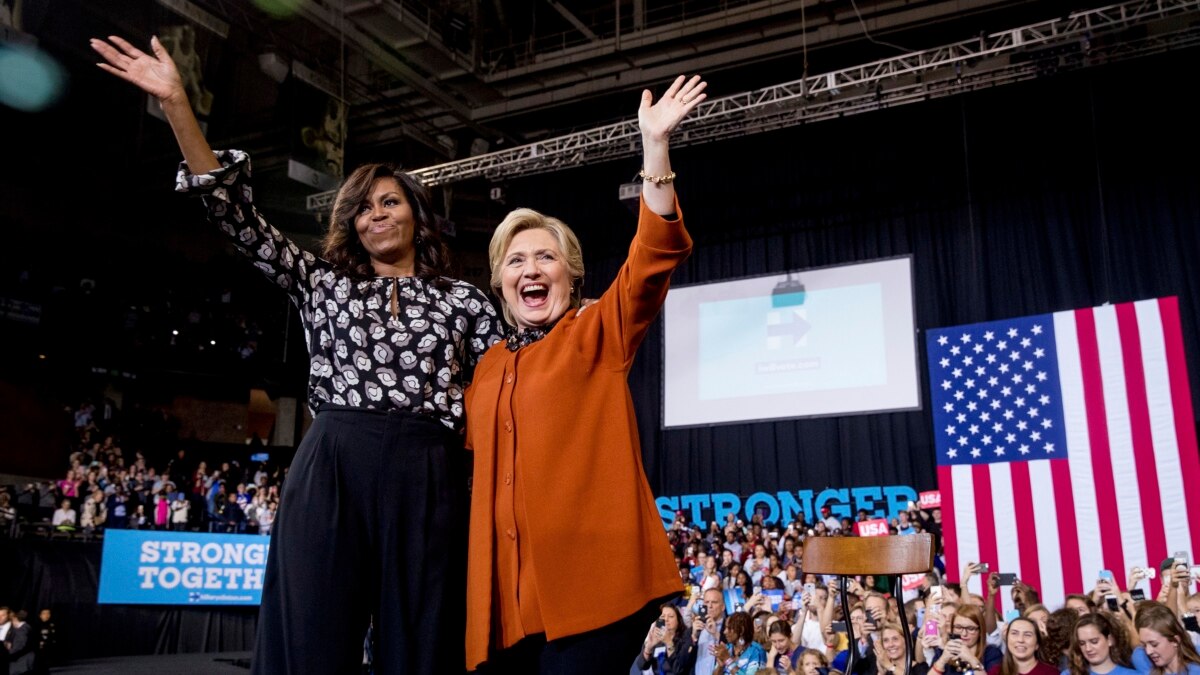 Clinton, Michelle Obama Share Presidential Campaign Stage For First Time