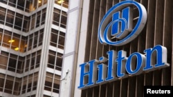 FILE - An exterior shot of the Hilton Midtown in New York June 7, 2013. Hilton plans to spin off its timeshare business and most of its real estate business in a move to boost shareholder value.