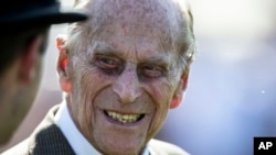 FILE - Prince Philip is pictured at the Royal Windsor Cup Final at the Guards Polo Club at Smith's Lawn in Windsor Great Park, near Windsor, England. June 24, 2018.