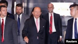 U.S. Commerce Secretary Wilbur Ross leaves a hotel ahead of trade talks with Chinese officials in Beijing, June 2, 2018. 