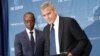 Actors George Clooney, right, and Don Cheadle, left, arrive for a press conference to discuss an investigation about corruption in South Sudan at the National Press Club in Washington, D.C. Sept. 12, 2016.