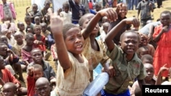 Refugee children, displaced by continued fighting in north Kivu province in the Democratic Republic of Congo (DRC), play at the Nyakabande refugee transit camp in Kisoro, southwest of Uganda's capital Kampala.