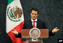 Mexico's President Enrique Pena Nieto said in a brief televised address Nov. 9, 2016, that he has spoken with U.S. President-elect Donald Trump to congratulate him and his family. He said they agreed to meet during the transition period to discuss the U.S.-Mexico relationship.