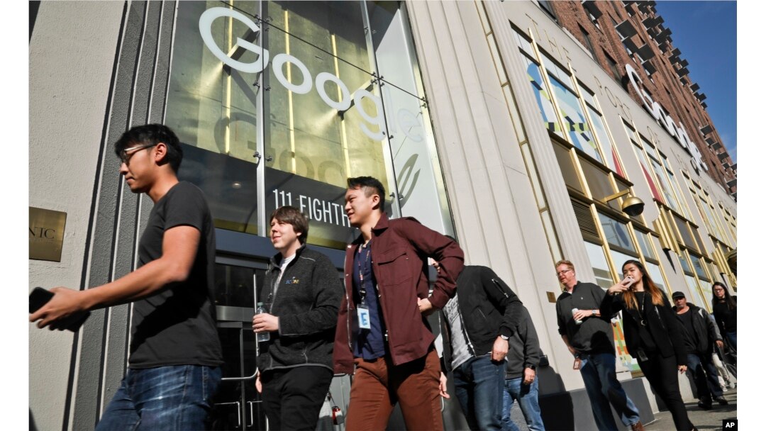 Google employees walk off the job in a protest against what they said is the tech company's mishandling of sexual misconduct allegations against executives on Nov. 1, 2018, in New York.