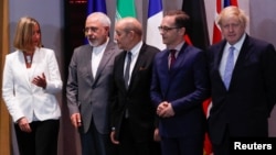 Britain's Foreign Secretary Boris Johnson, German Foreign Minister Heiko Maas, French Foreign Minister Jean-Yves Le Drian and EU High Representative for Foreign Affairs Federica Mogherini take part in meeting with Iran's Foreign Minister Mohammad Javad Zarif in Brussels, Belgium, May 15, 2018. 