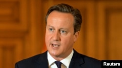Thủ tướng Anh David Cameron tuyên bố với giới truyền thông sau vụ sát hại nhân viên cứu trợ David Haines, ngày 14/9/2014. Ông Cameron nói thêm rằng nước Anh phải loại trừ mối đe dọa của Nhà nước Hồi giáo.