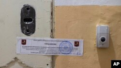 The office of Amnesty International is sealed by Moscow city authorities in Moscow, Russia, Nov. 2, 2016.