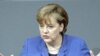 Меркель ждет от Олланда помощи в борьбе с долговым кризисом в ЕС