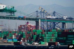 Containers are stacked at the Port of Los Angeles in Los Angeles, Oct. 1, 2021.