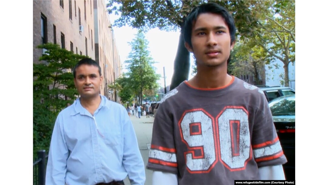 Tek Nath and his father, refugees from Nepal.