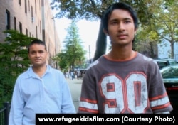 Tek Nath and his father, refugees from Nepal.