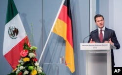 Mexican President Enrique Pena Nieto speaks at the Mexican-German Business Summit at the Hanover Fair, in Hanover, Germany, April 23, 2018.