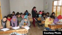 Students learn the Kurdish language at a local school in Amude, Syria, in August 2015. (Photo courtesy of Bedirxan Committee for Teaching Kurdish)