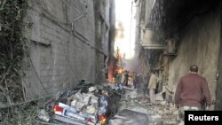Explosions Rip Through Damascus Suburb